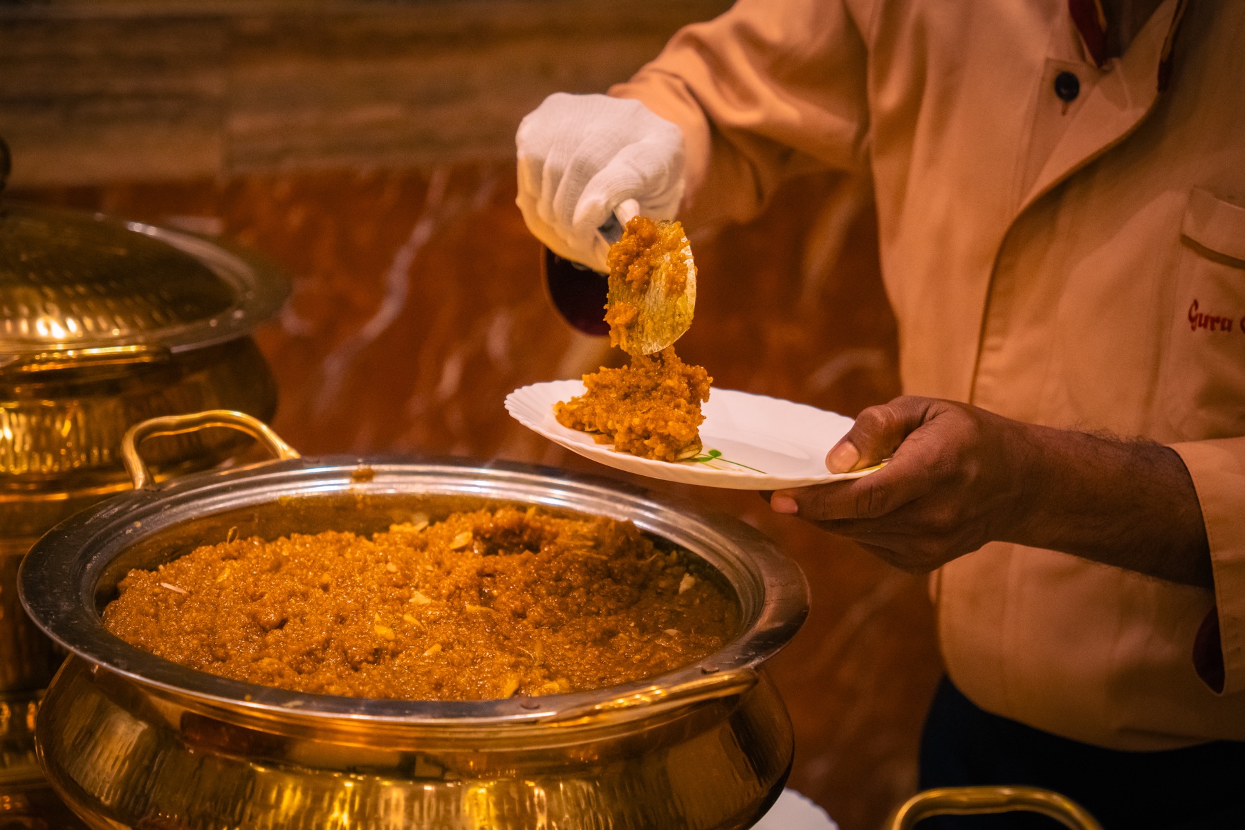 Guru Caterer team serving a Kolkata celebration